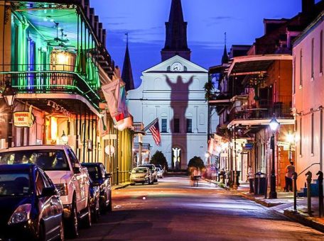 The Streets of the French Quarter lit up at night